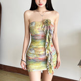 Blooming romantic flowers and tiered ruffle dress